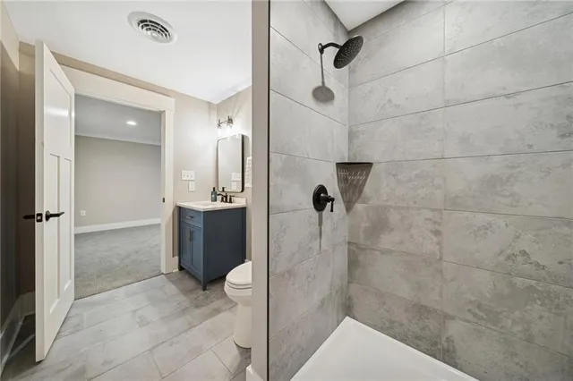 a bathroom with a sink and shower