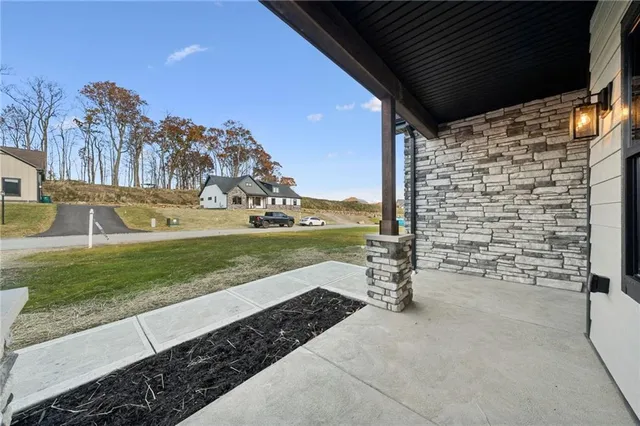 a view of a pathway with a yard