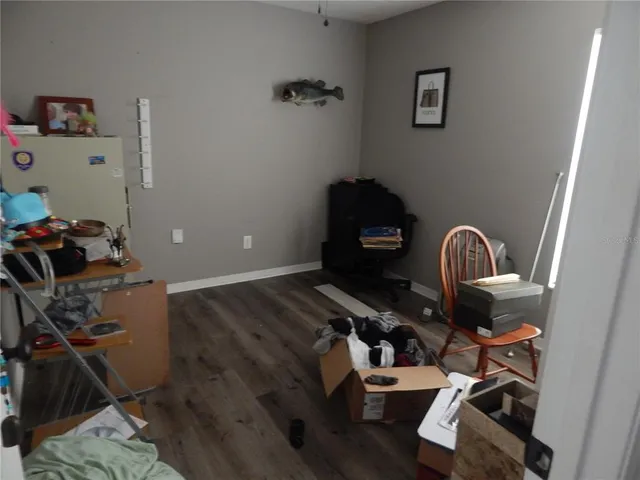 a view of workspace with wooden floor