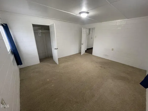 an empty room with closet