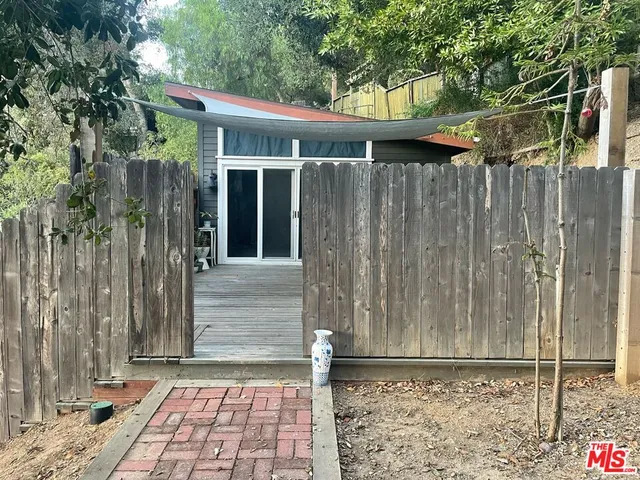 a front view of a house with a glass door