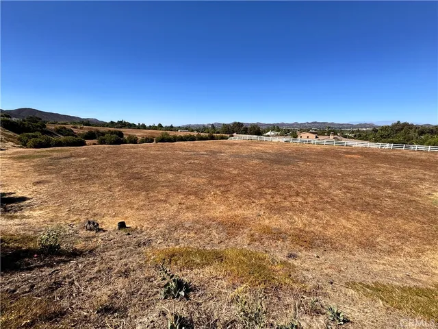a view of an ocean and city