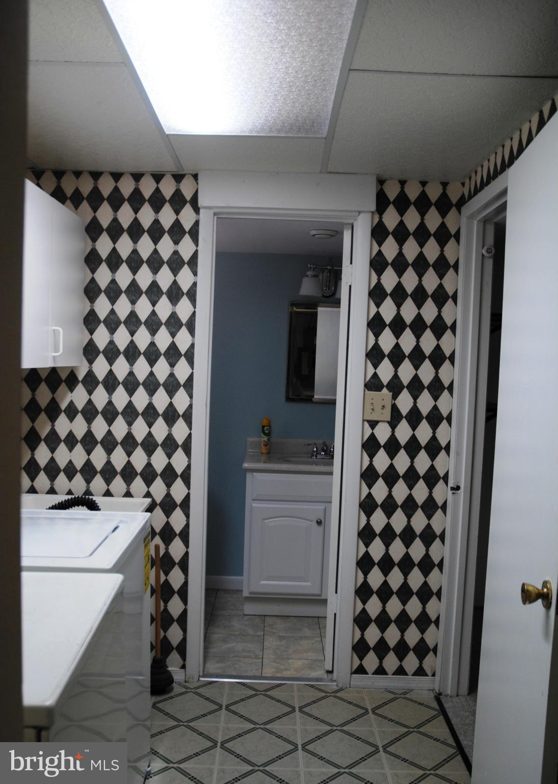 13011 Tamarack Road Silver Spring, MD 20904 - Photo 19 of 30 Laundry Room with window to backyard!