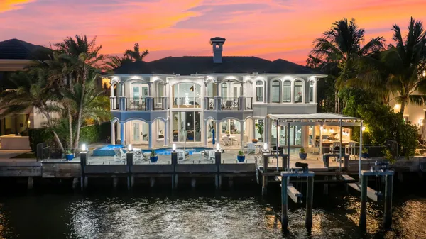 a front view of a house with a ocean view