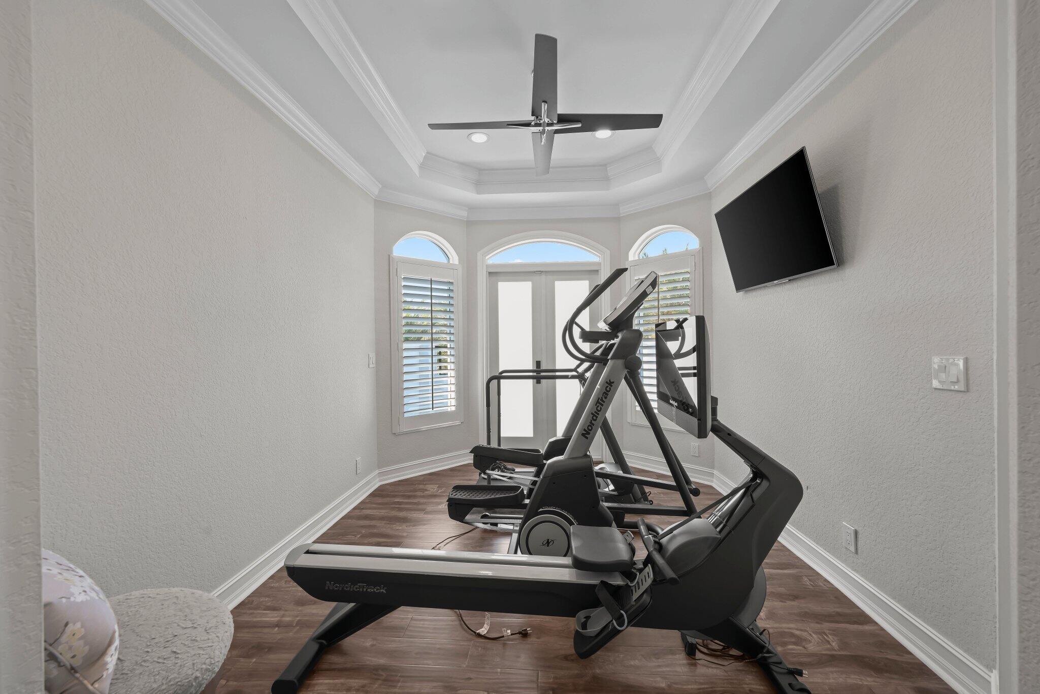 7188 Northeast 8th Drive Boca Raton, FL 33487 - Photo 51 of 77 Primary bedroom gym