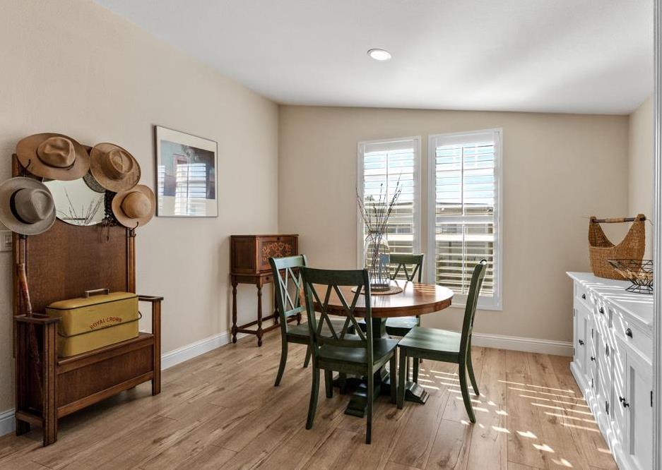 128 Don Felipe Ojai, CA 93023 - Photo 11 of 35 a view of a dining room with furniture and wooden floor