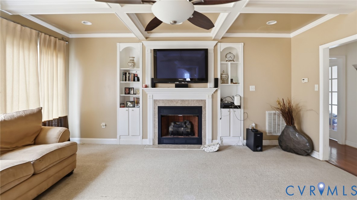4510 Bell Road Powhatan, VA 23139 - Photo 7 of 12 a living room with furniture and a fireplace