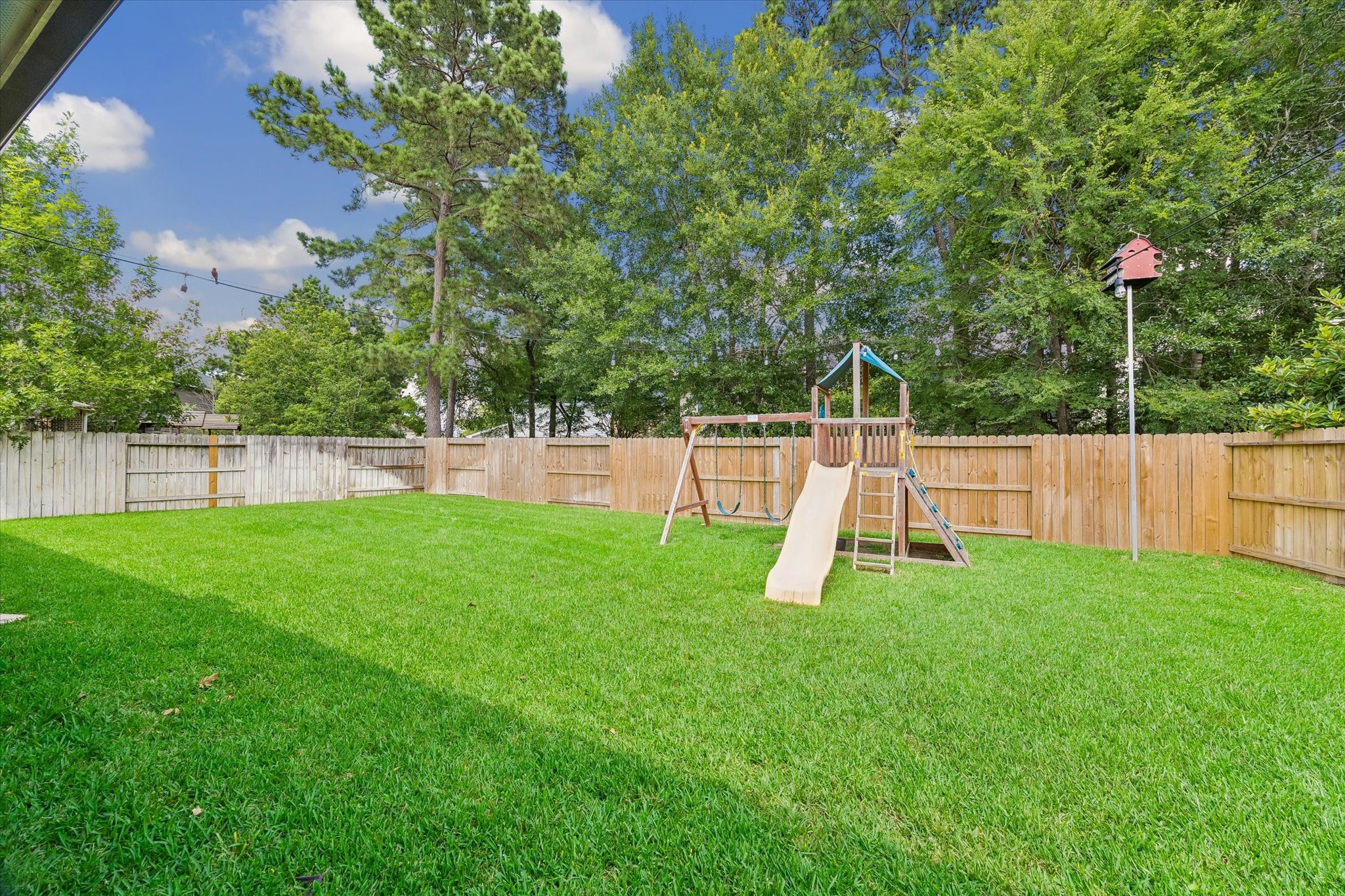 31306 Brighton Brook Lane Spring, TX 77386 - Photo 30 of 34 Generously sized backyard offering endless possibilities for recreation, gardening and outdoor enjoyment.