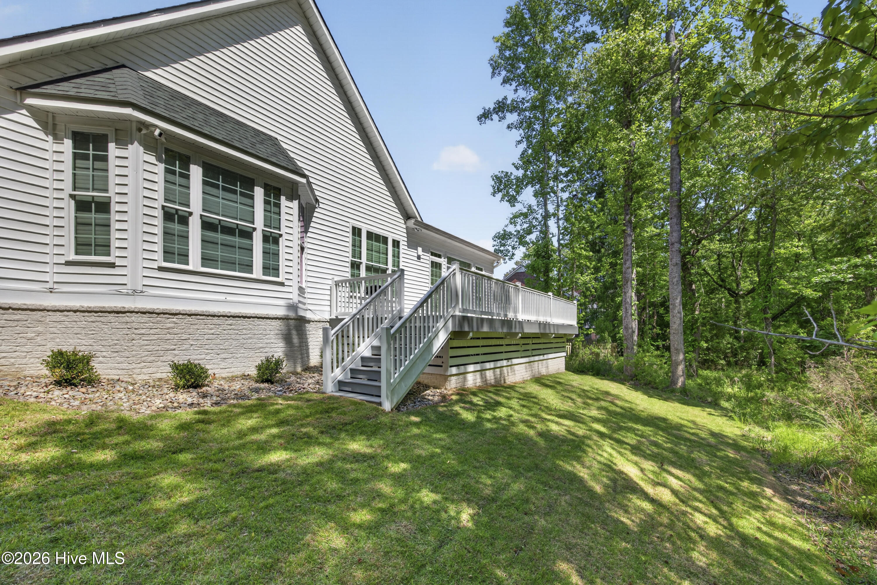 115 Windy Point Sneads Ferry, NC 28460 - Photo 4 of 43 Back Deck & Primary Bed Windows