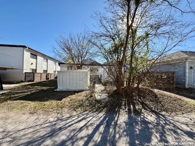 325 East Locust Street San Antonio, TX 78212 - Photo 25 of 30 a view of a house with a yard covered in snow