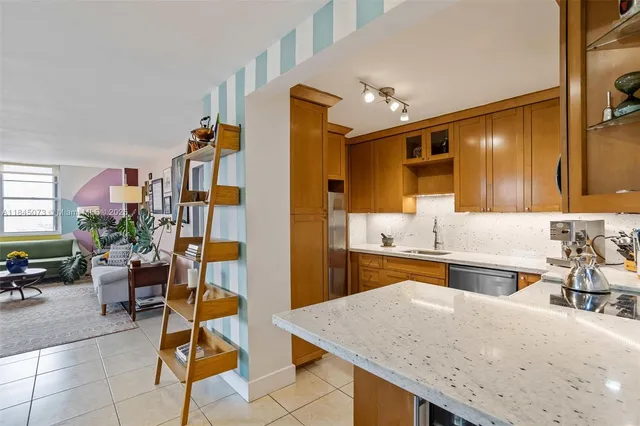a large kitchen with a table and chairs in it