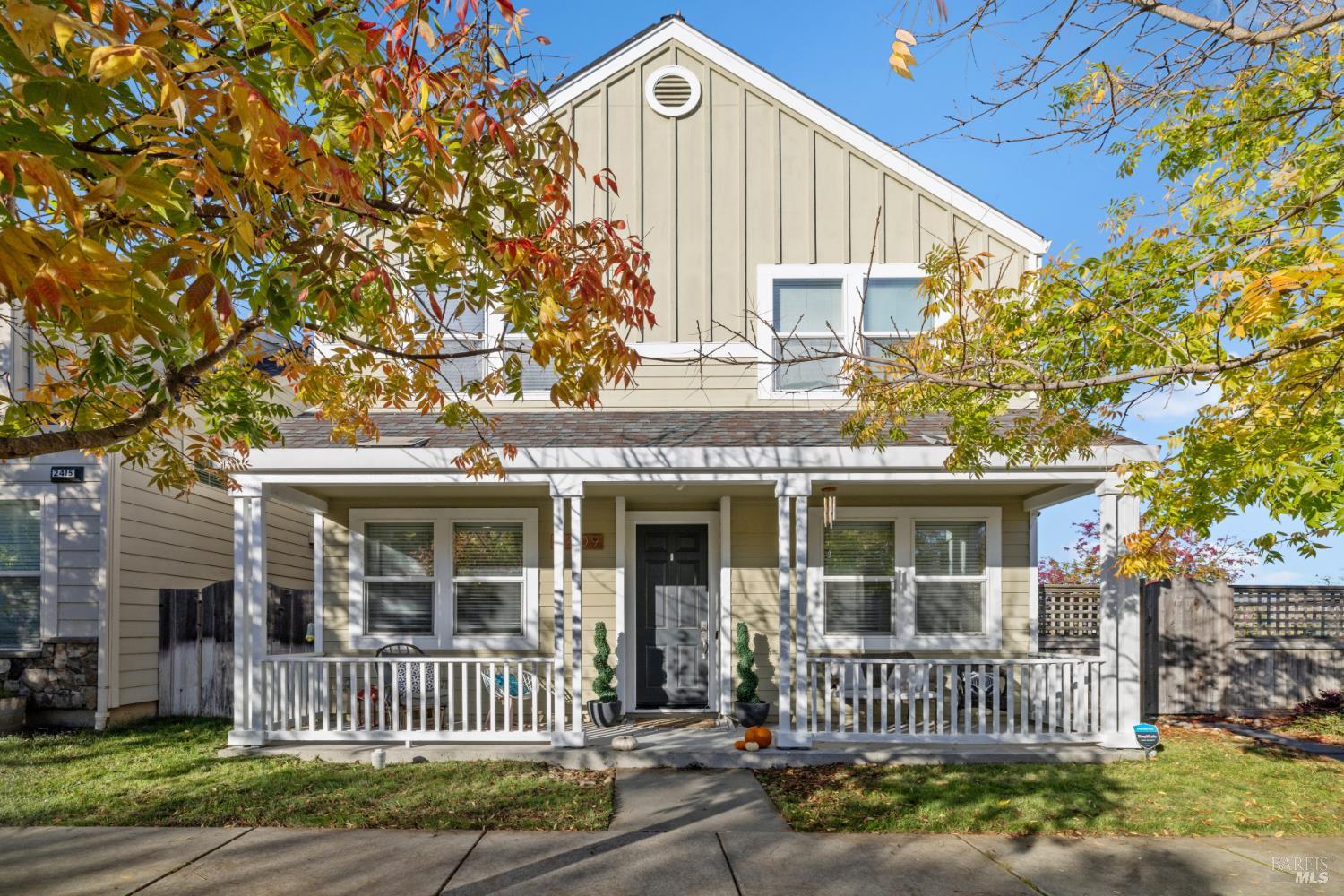 front view of a house with a small yard
