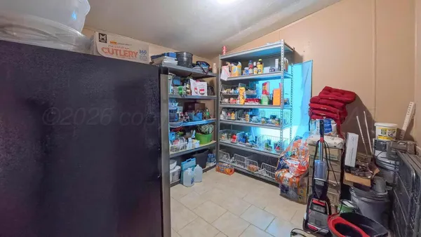 a room with storage and utility