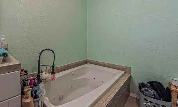 a bathroom with a bathtub