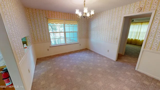 an empty room with windows