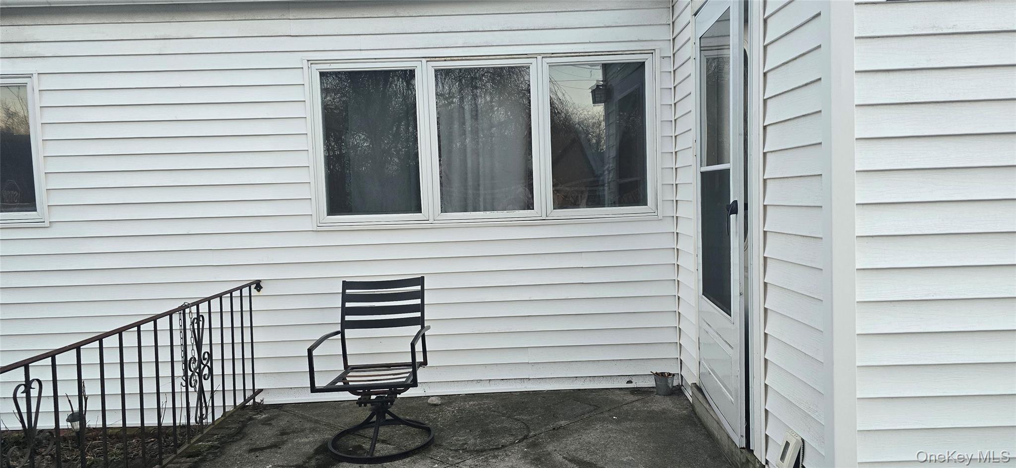 2 Ivy Road Mastic Beach, NY 11951 - Photo 11 of 25 a view of a house with a white door