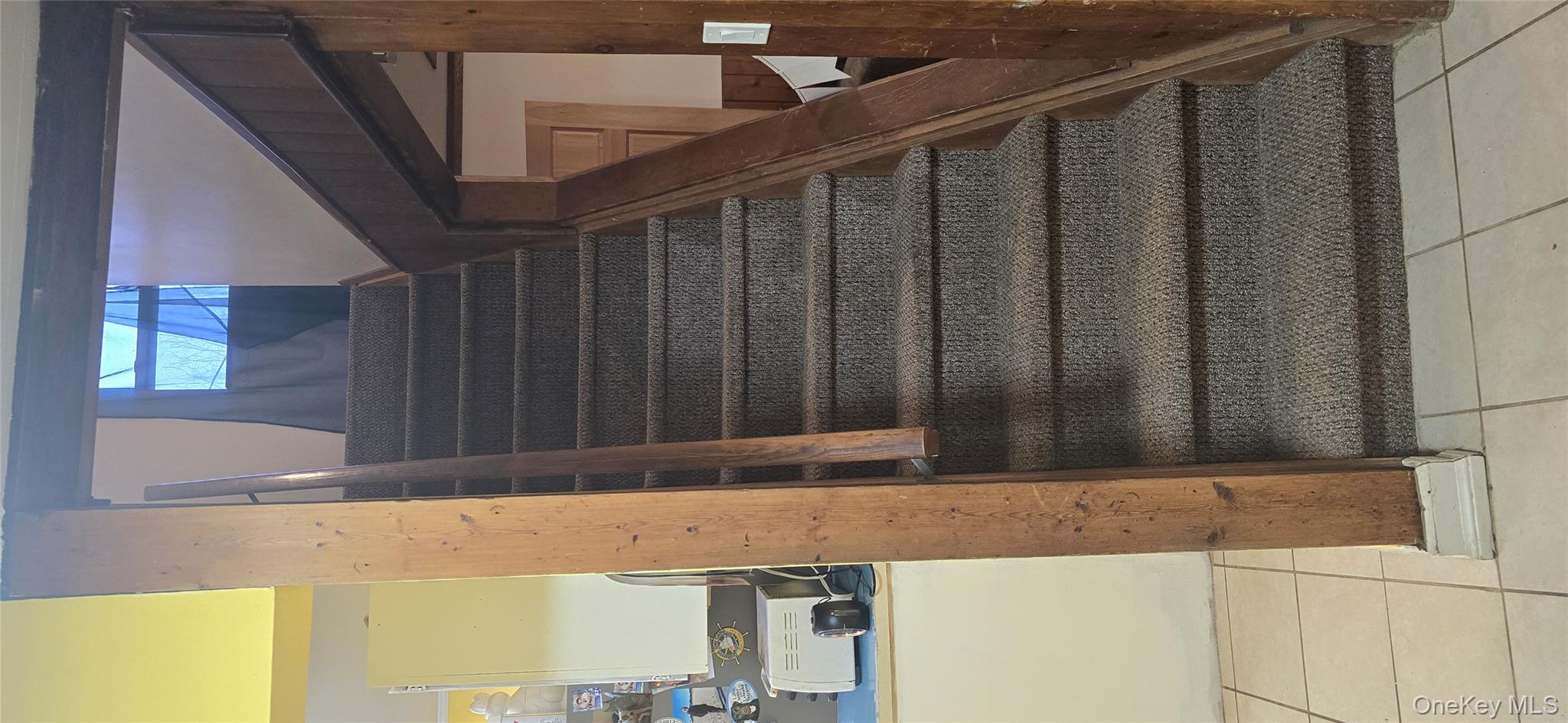 2 Ivy Road Mastic Beach, NY 11951 - Photo 12 of 25 a view of entryway and hall with wooden floor