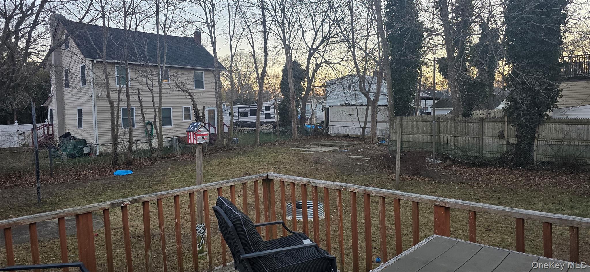 2 Ivy Road Mastic Beach, NY 11951 - Photo 17 of 25 a view of a brick house with a small yard