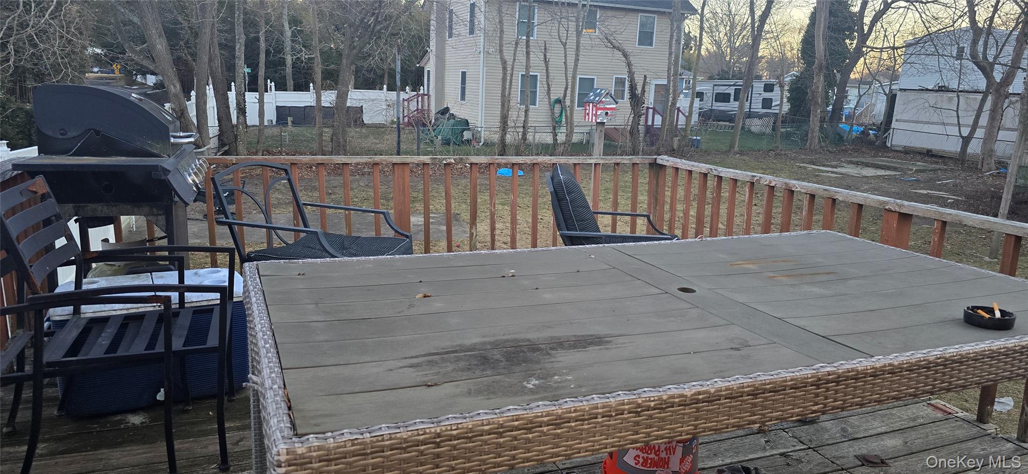 2 Ivy Road Mastic Beach, NY 11951 - Photo 18 of 25 a view of balcony with two chairs and wooden fence