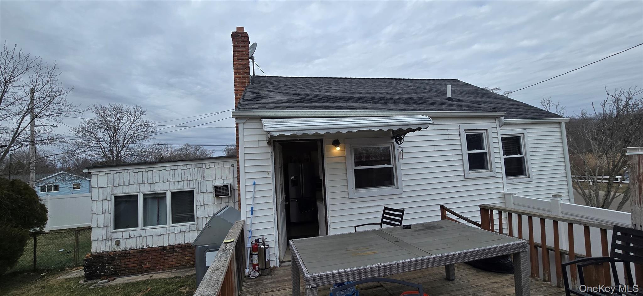 2 Ivy Road Mastic Beach, NY 11951 - Photo 22 of 25 a front view of a house with barbeque grill
