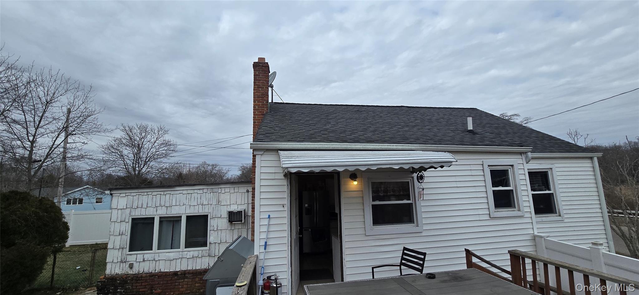 2 Ivy Road Mastic Beach, NY 11951 - Photo 23 of 25 a front view of a house with plants