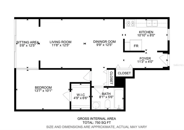 a kitchen with granite countertop a sink cabinets and wooden floor