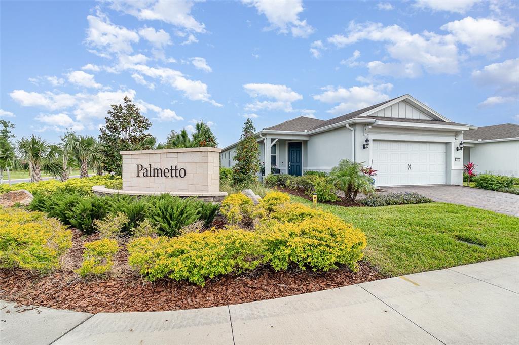 2587 Cliff Way St. Cloud, FL 34771 - Photo 1 of 1 a front view of a house with garden