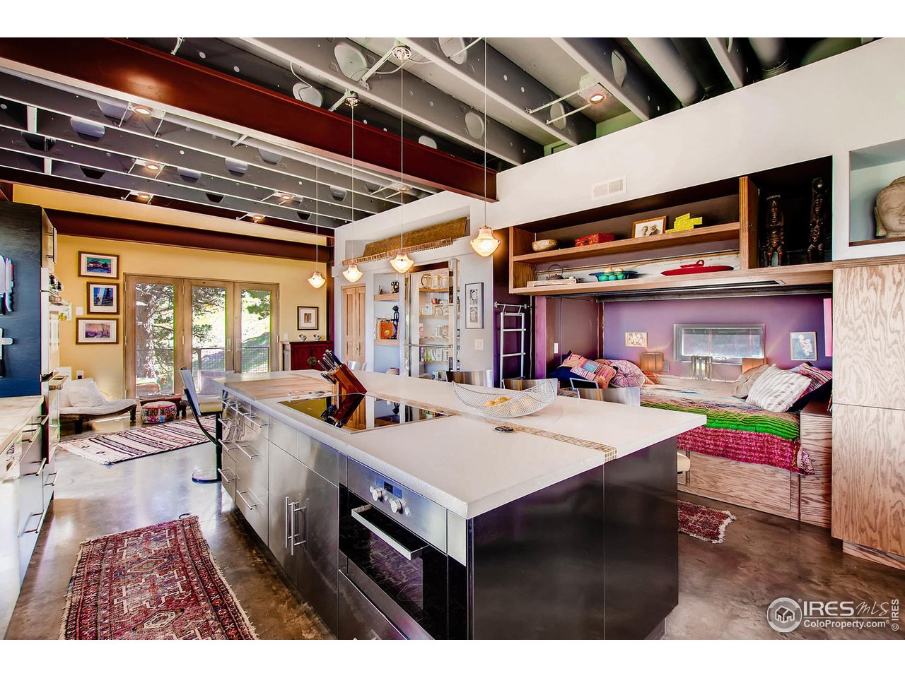 1440 Reed Ranch Road Boulder, CO 80302 - Photo 15 of 40 a living room with furniture and flat screen tv