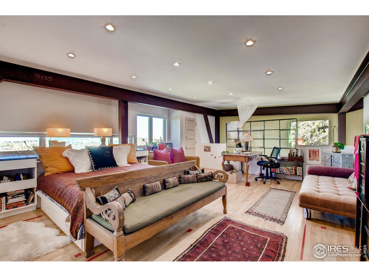 1440 Reed Ranch Road Boulder, CO 80302 - Photo 10 of 40 a living room with furniture and a large window