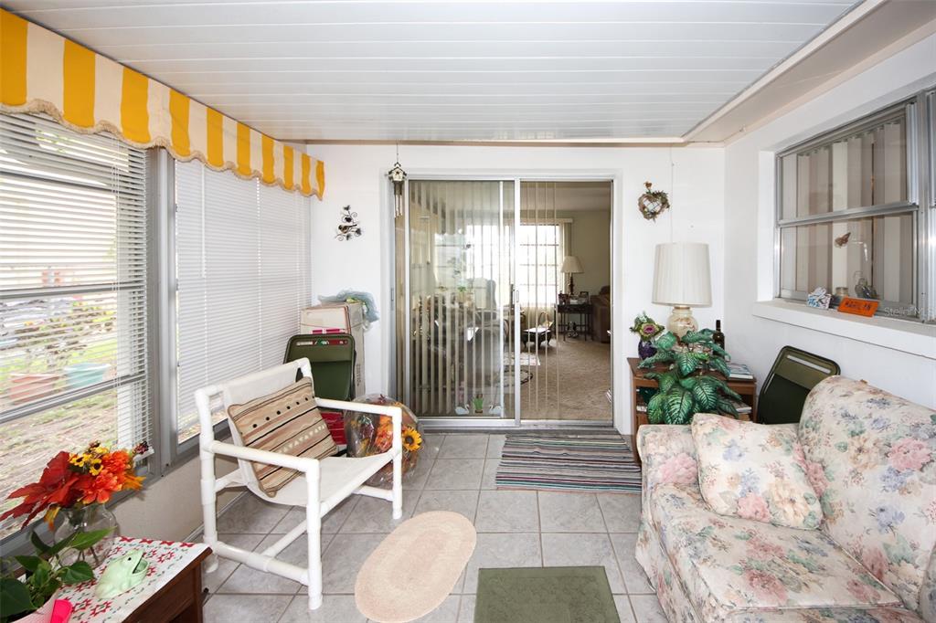 10638 Oak Hill Drive Port Richey, FL 34668 - Photo 22 of 29 a living room with furniture