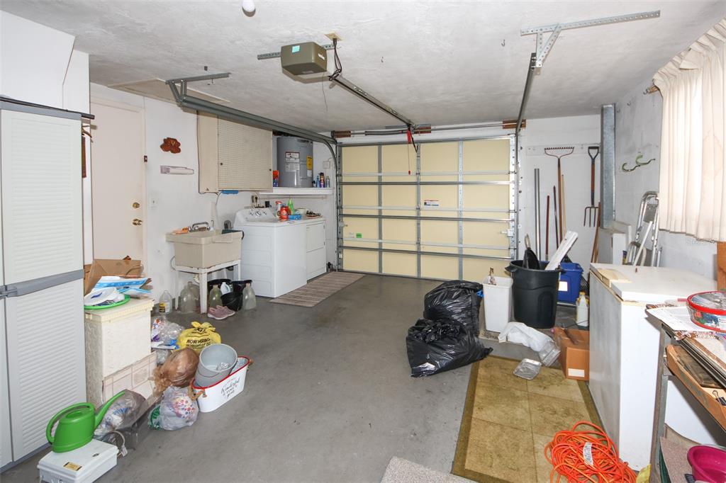 10638 Oak Hill Drive Port Richey, FL 34668 - Photo 25 of 29 a bedroom with furniture and a window