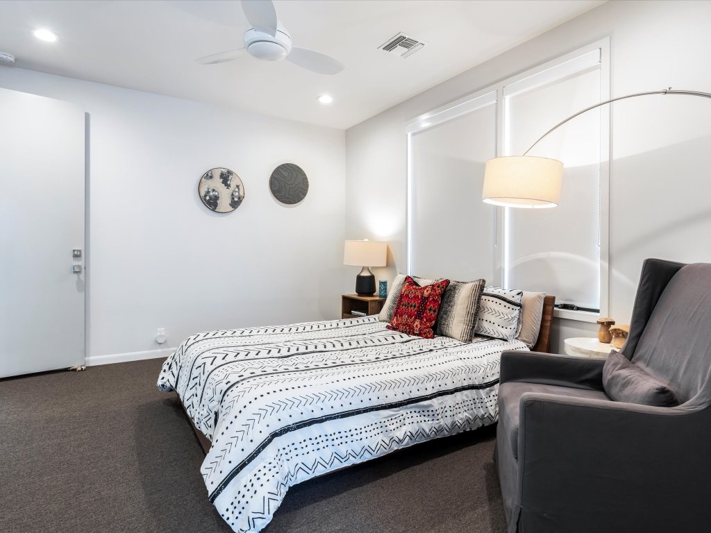 1703 Dexter Street Austin, TX 78704 - Photo 24 of 34 Carpeted bedroom featuring recessed lighting and ceiling fan