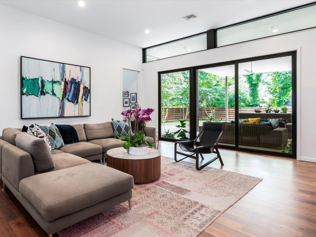 1703 Dexter Street Austin, TX 78704 - Photo 10 of 34 Living area with wood finished floors and recessed lighting