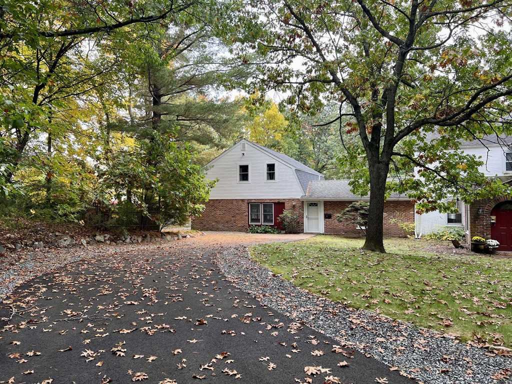 46 Auburndale Avenue, Unit 46 Newton, MA 02465 - Photo 1 of 17 a front view of house with yard and trees around