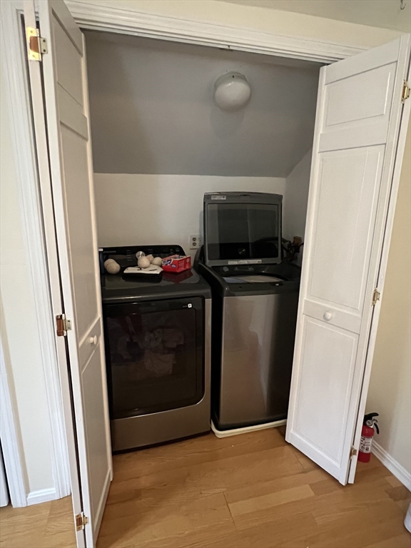46 Auburndale Avenue, Unit 46 Newton, MA 02465 - Photo 14 of 17 a utility room with washer and dryer