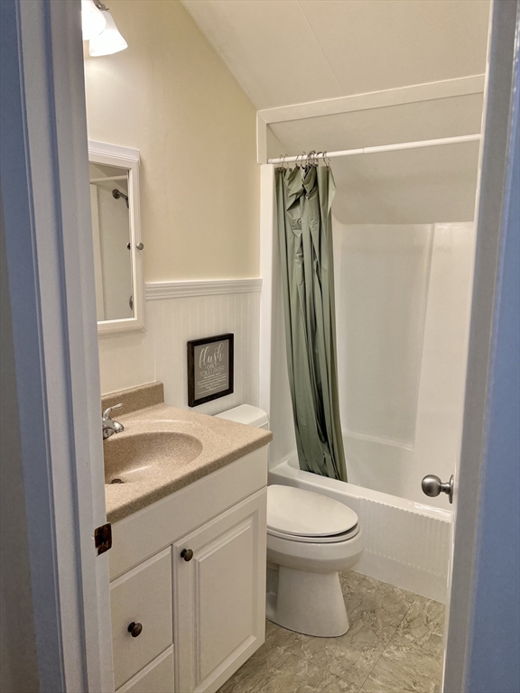 46 Auburndale Avenue, Unit 46 Newton, MA 02465 - Photo 15 of 17 a bathroom with a granite countertop sink toilet and shower