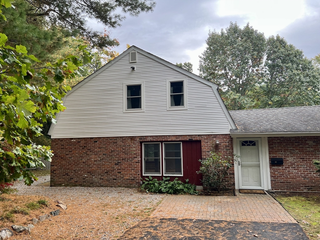 46 Auburndale Avenue, Unit 46 Newton, MA 02465 - Photo 2 of 17 a front view of a house with garden