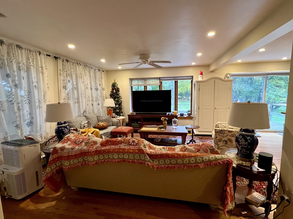 46 Auburndale Avenue, Unit 46 Newton, MA 02465 - Photo 6 of 17 a living room with furniture and a flat screen tv