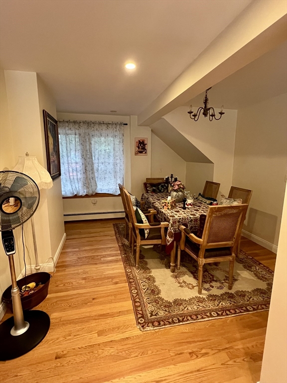 46 Auburndale Avenue, Unit 46 Newton, MA 02465 - Photo 7 of 17 a living room with furniture and wooden floor