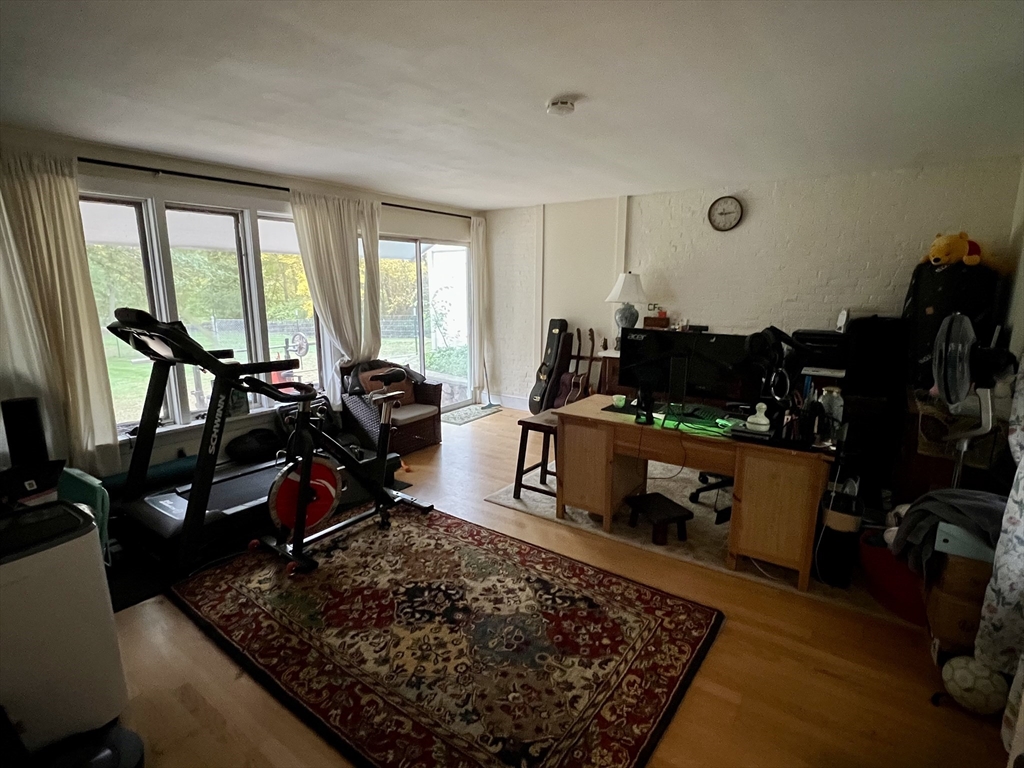 46 Auburndale Avenue, Unit 46 Newton, MA 02465 - Photo 8 of 17 a room with lots of furniture and windows