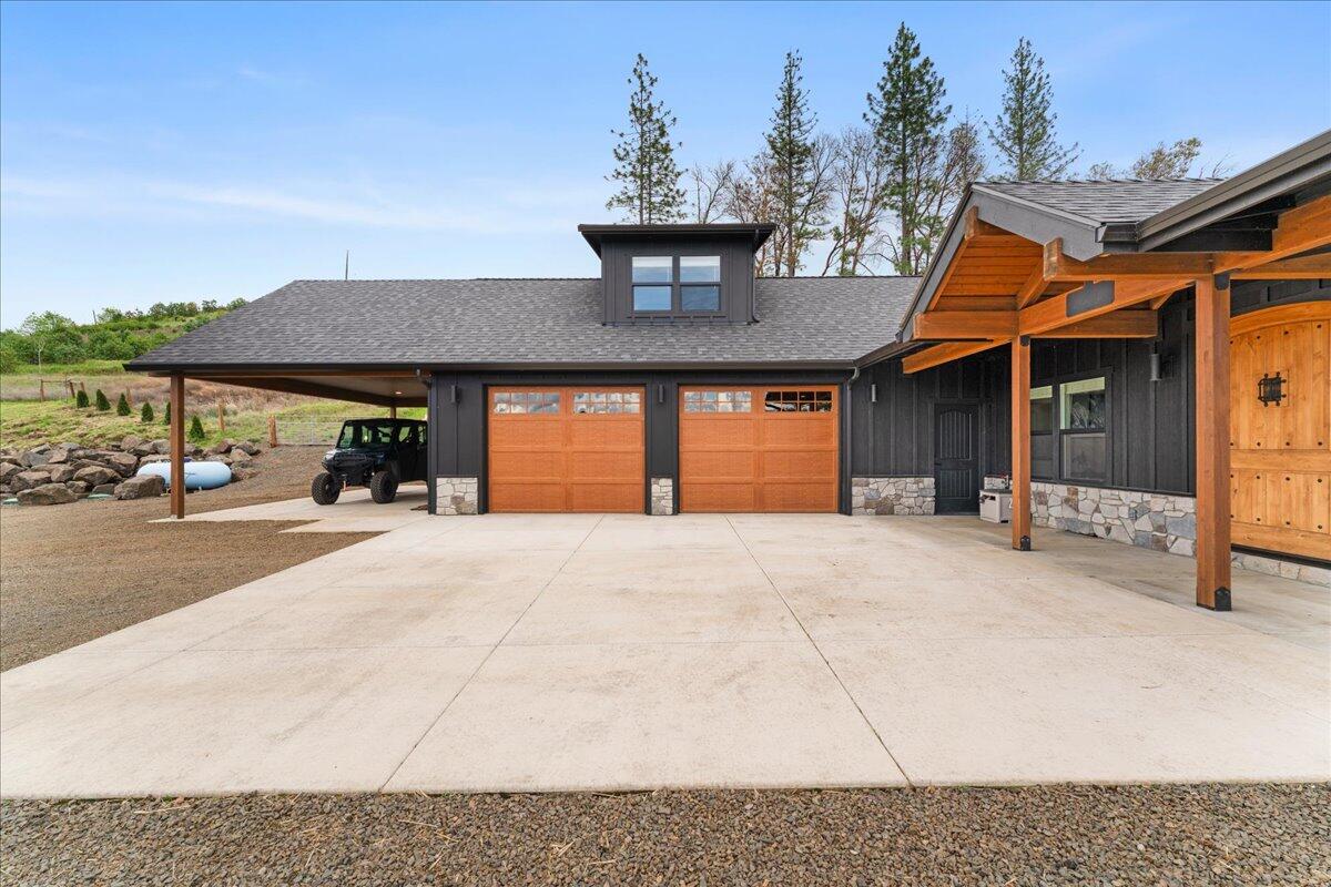 2220 Butte Falls Highway Eagle Point, OR 97524 - Photo 5 of 69 a view of a house with a patio