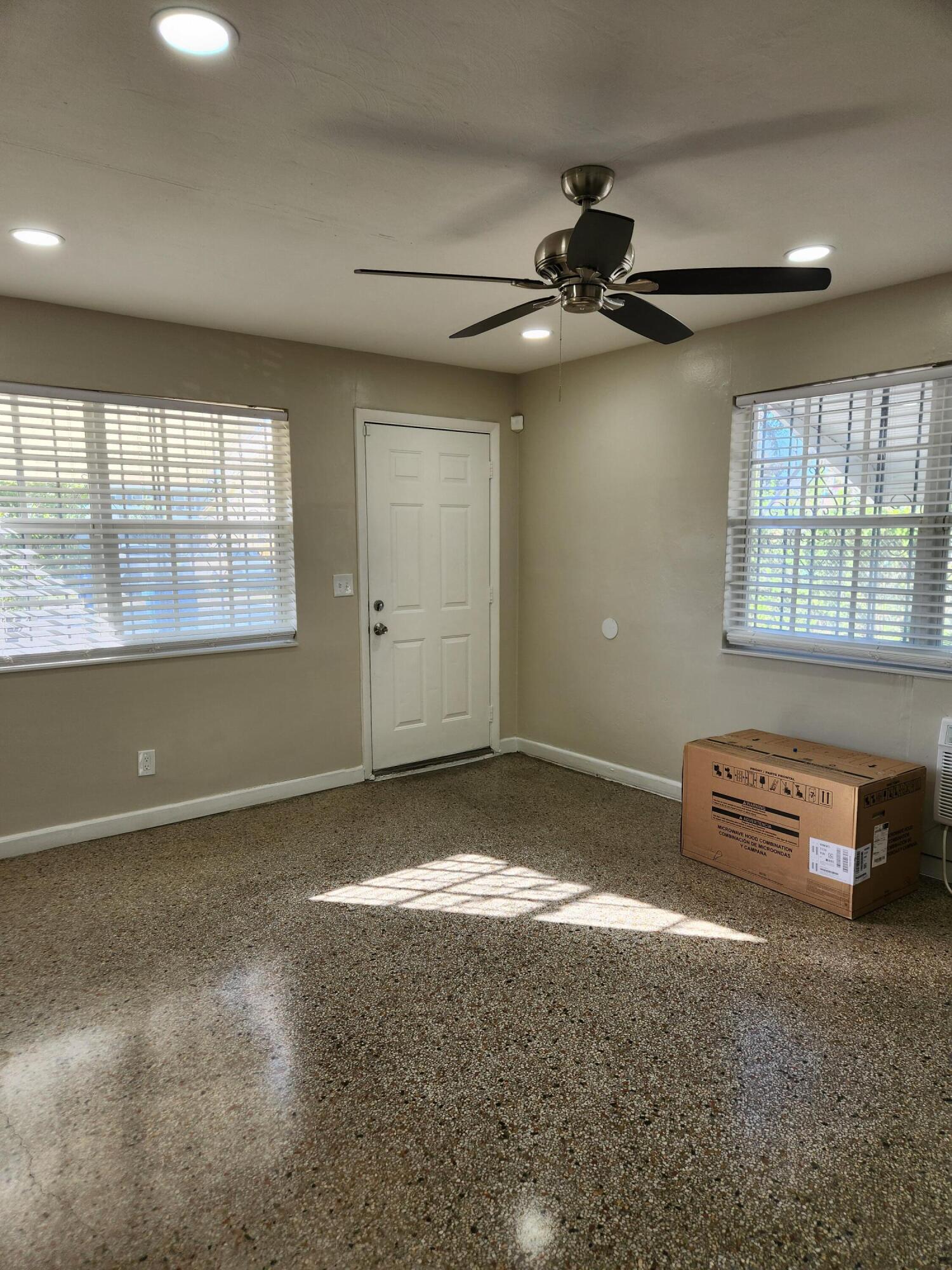 136 West 34th Street, Unit A Riviera Beach, FL 33404 - Photo 11 of 12 a view of a livingroom with furniture