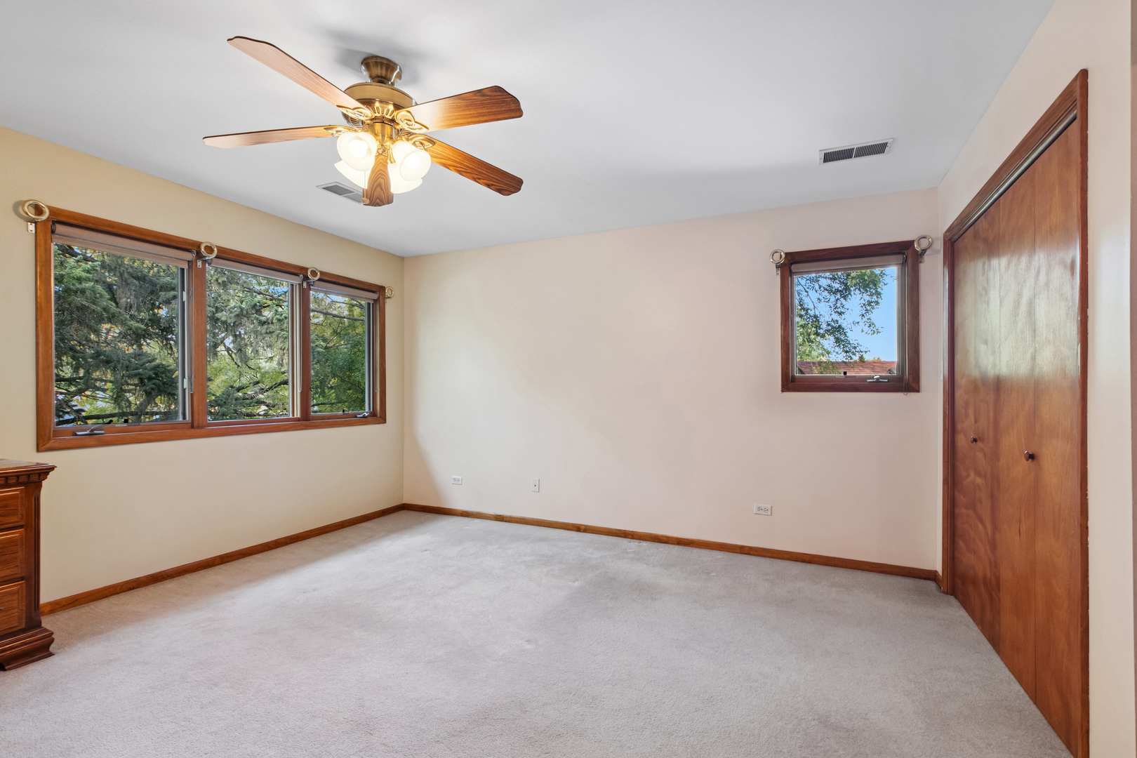 1253 Arthur Street Calumet City, IL 60409 - Photo 11 of 20 an empty room with windows and fan