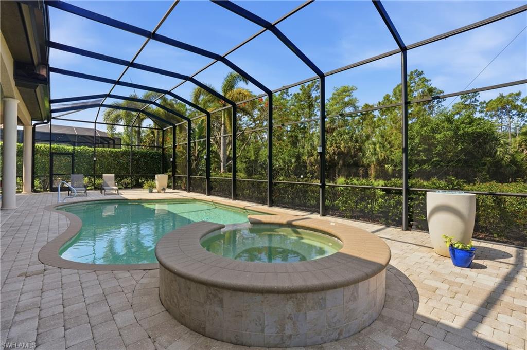 6453 Costa Circle Naples, FL 34113 - Photo 34 of 47 Pool & Spa featuring two beautiful fire bowls