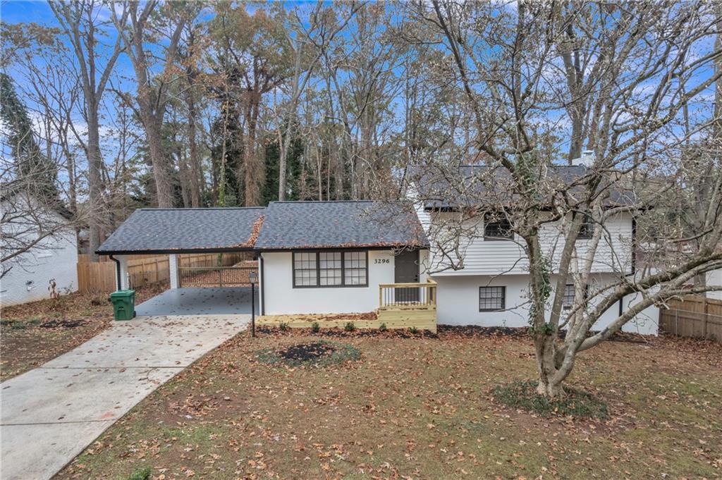 3296 Columbia Woods Drive Decatur, GA 30032 - Photo 2 of 47 front view of a house with a dry yard