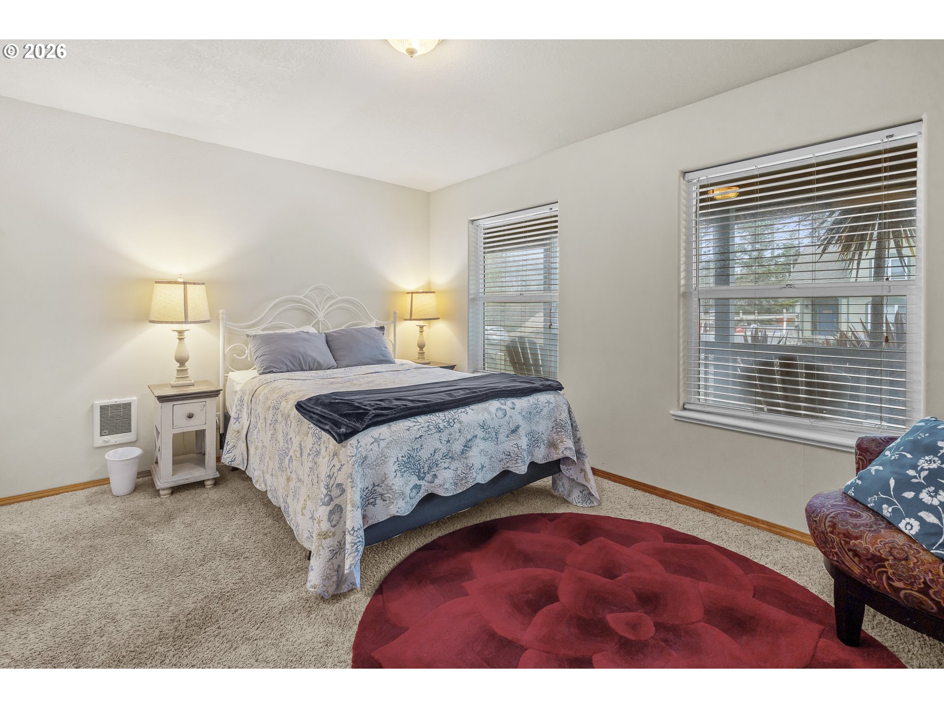 7850 Pine Beach Loop Rockaway Beach, OR 97136 - Photo 16 of 33 a bedroom with a bed and a window