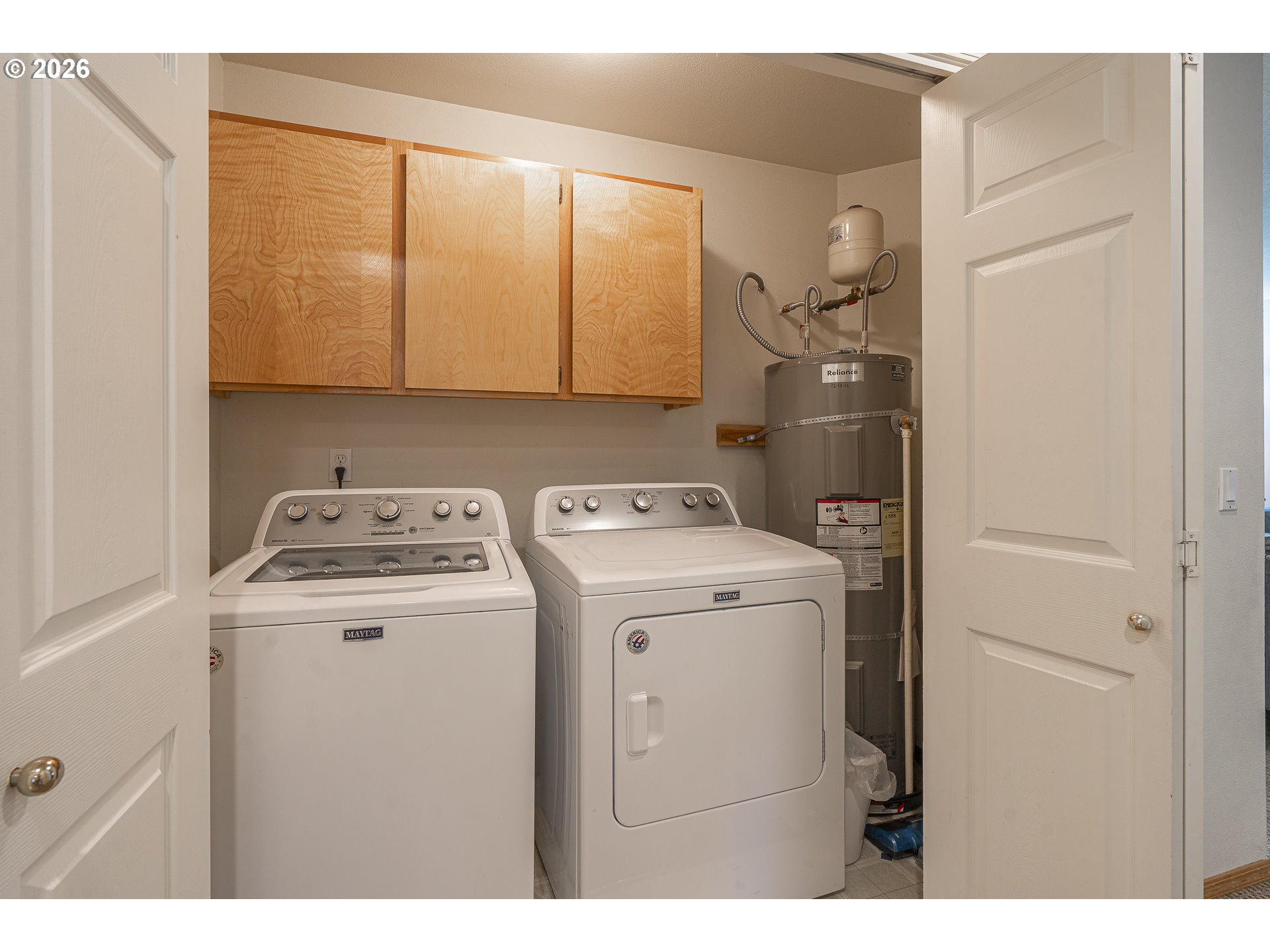 7850 Pine Beach Loop Rockaway Beach, OR 97136 - Photo 23 of 33 a utility room with dryer and washer