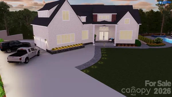 a view of a house with roof deck and couches in the patio