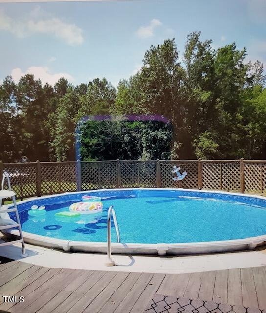 663 Fleming Road Coats, NC 27521 - Photo 20 of 42 a view of a tennis court