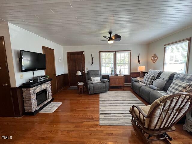 663 Fleming Road Coats, NC 27521 - Photo 2 of 42 a living room with furniture and a flat screen tv